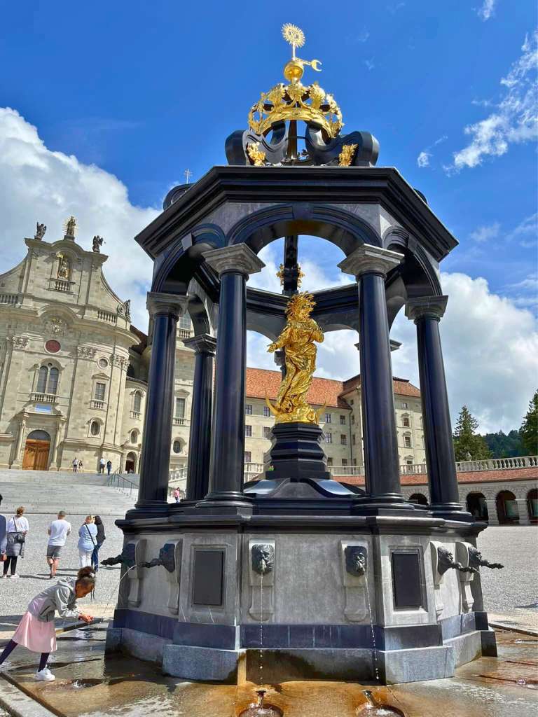 fountain in front of abbey