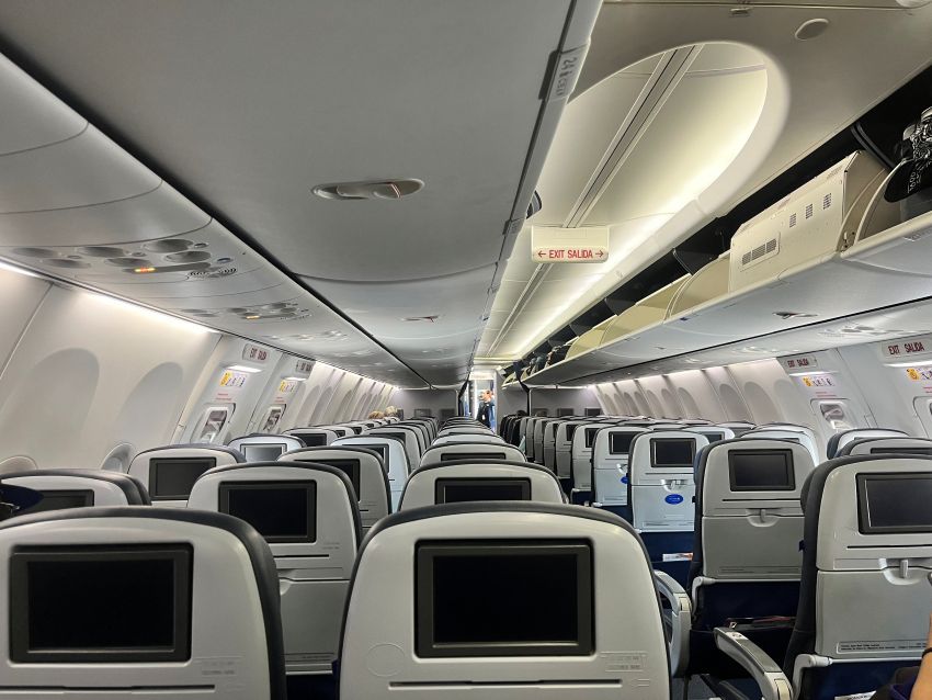 inside airplane economy rows