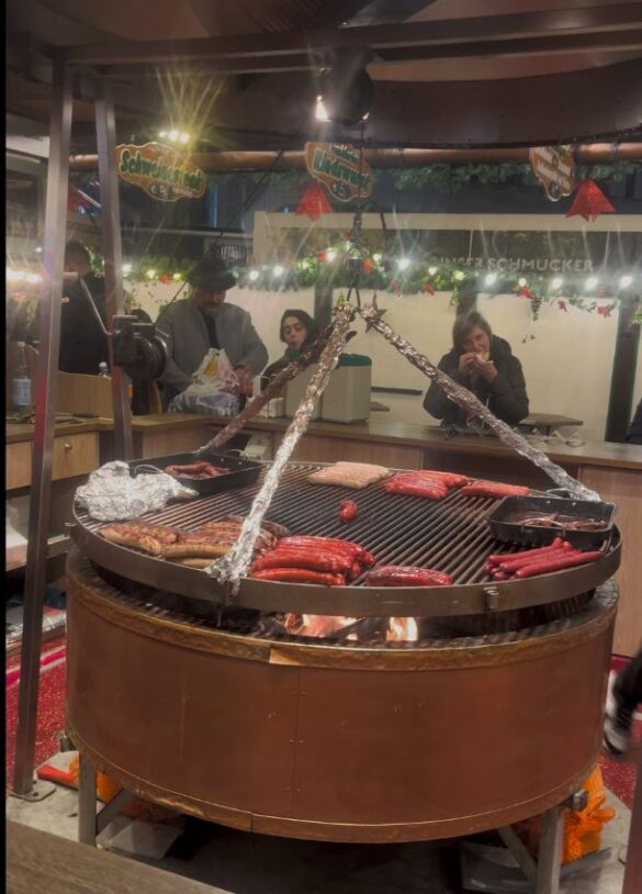 Hanging grill at Christmas market Hanging grill at Christmas market