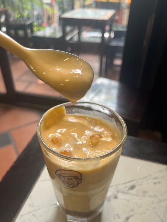 Iced egg coffee with a thick creamy topping at Café Giảng in Hanoi