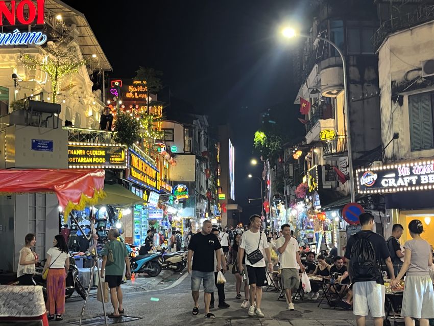 Night street scene in Hanoi Old Quarter