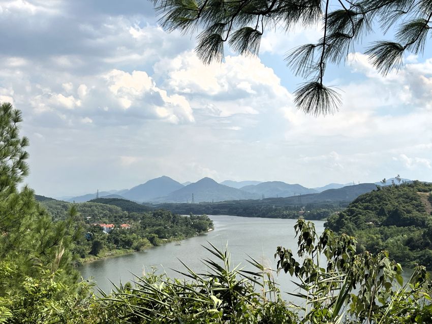 Perfume River with distant mountains in Hue