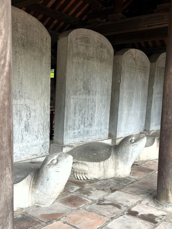 Stone tablets resting on carved turtles at the Temple of Literature in Hanoi